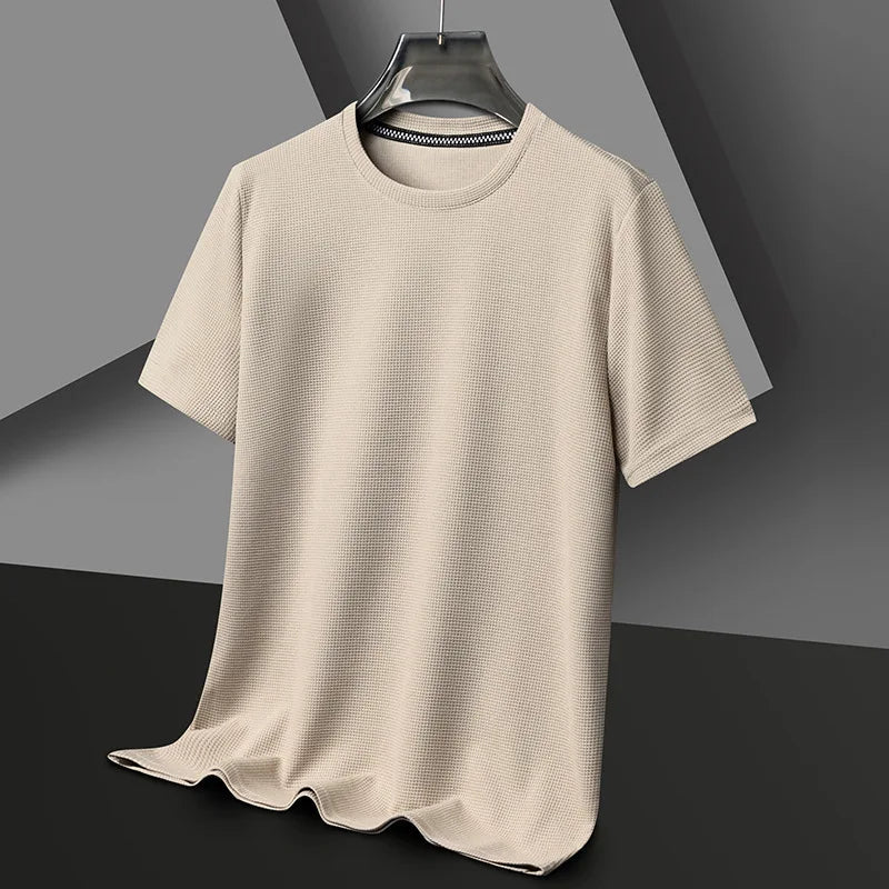 Beige waffle knit crewneck t-shirt for men on hanger with textured short sleeves and relaxed fit