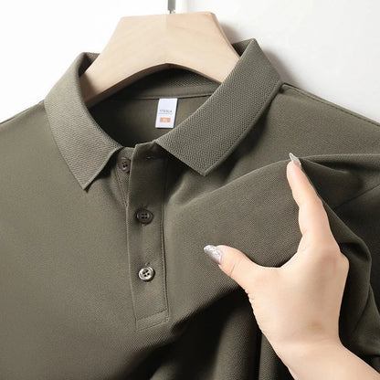 Army green men's cotton polo shirt on hanger, size XL, featuring button placket and classic collar, shown with fabric detail.