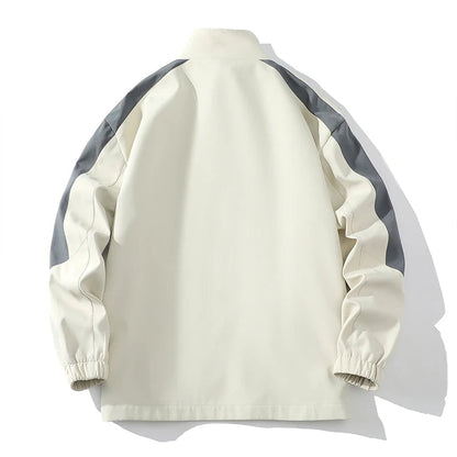 Men's cream and gray striped tracksuit jacket with elastic cuffs laid flat on white background
