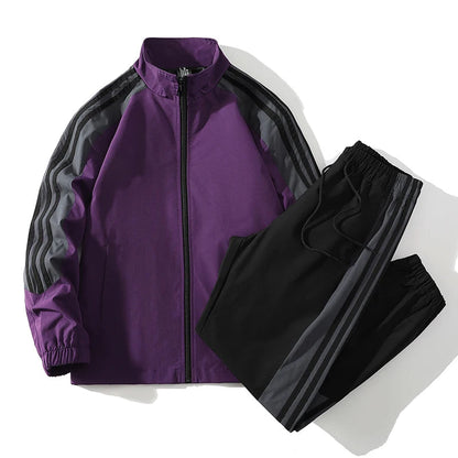 Purple and black men's full-zip tracksuit set with gray stripe detail on sleeves and matching jogger pants