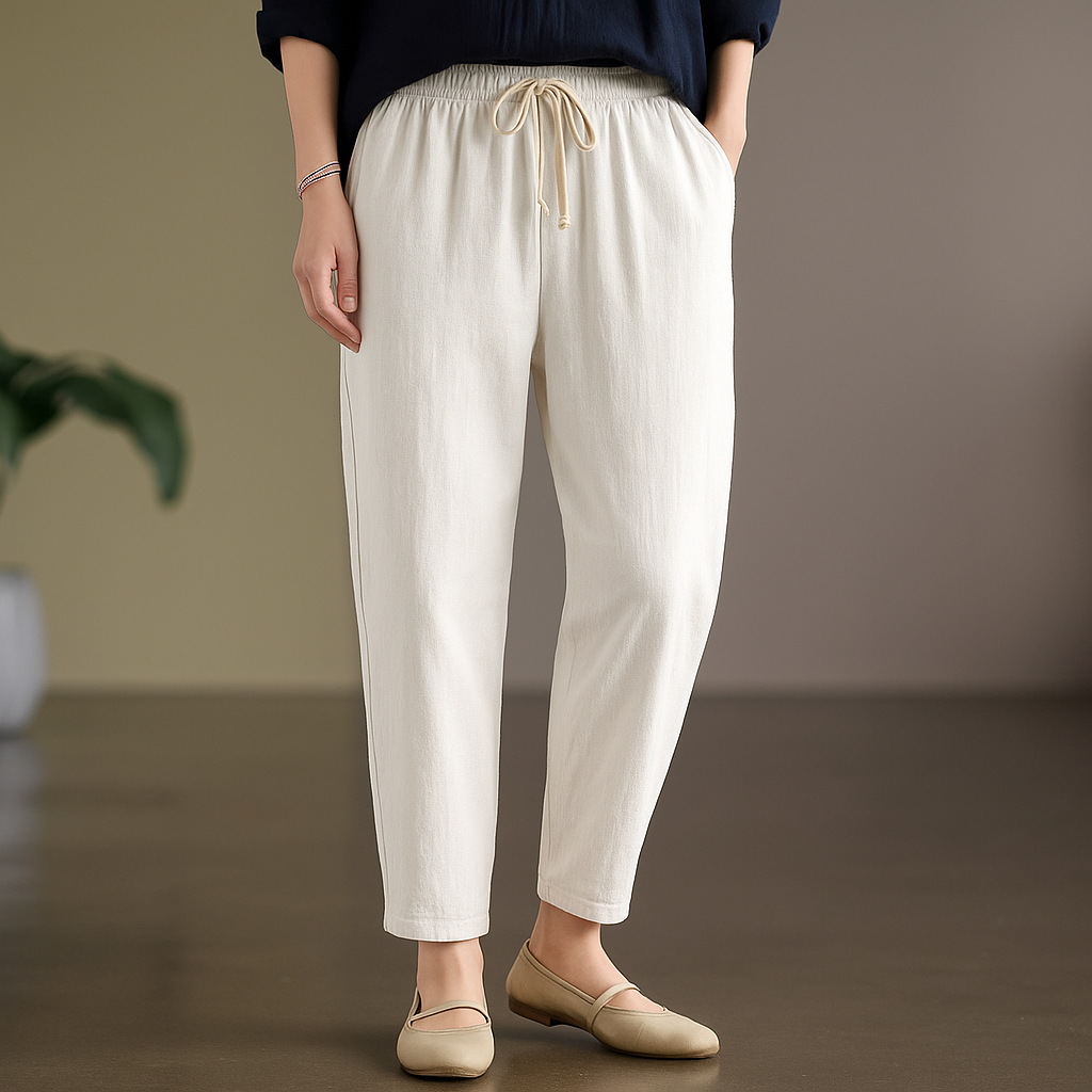 Women's beige linen drawstring tapered pants with elastic waist and relaxed fit for casual wear