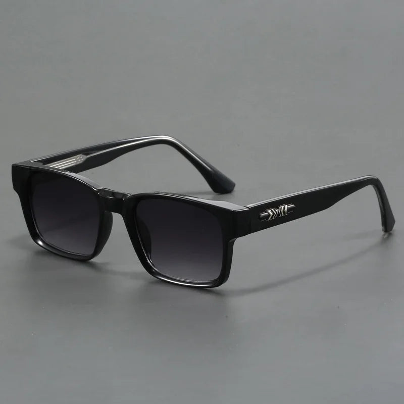 Black rectangular frame sunglasses with gradient dark lenses and silver arrow detail on temples, men's style