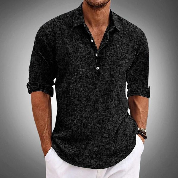 Man wearing black linen long sleeve Henley polo shirt with white pants, casual relaxed fit with button collar