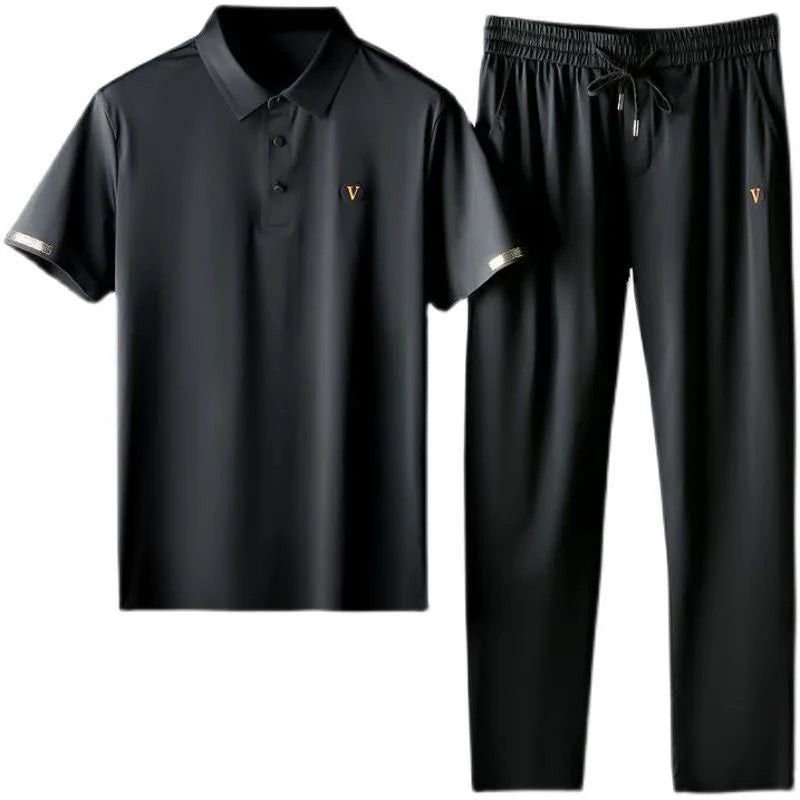 Black men's Viero polo shirt and drawstring pants matching set with gold V emblem and elastic waistband