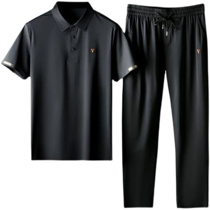 Black men's Viero polo shirt and drawstring pants matching set with gold V emblem and elastic waistband