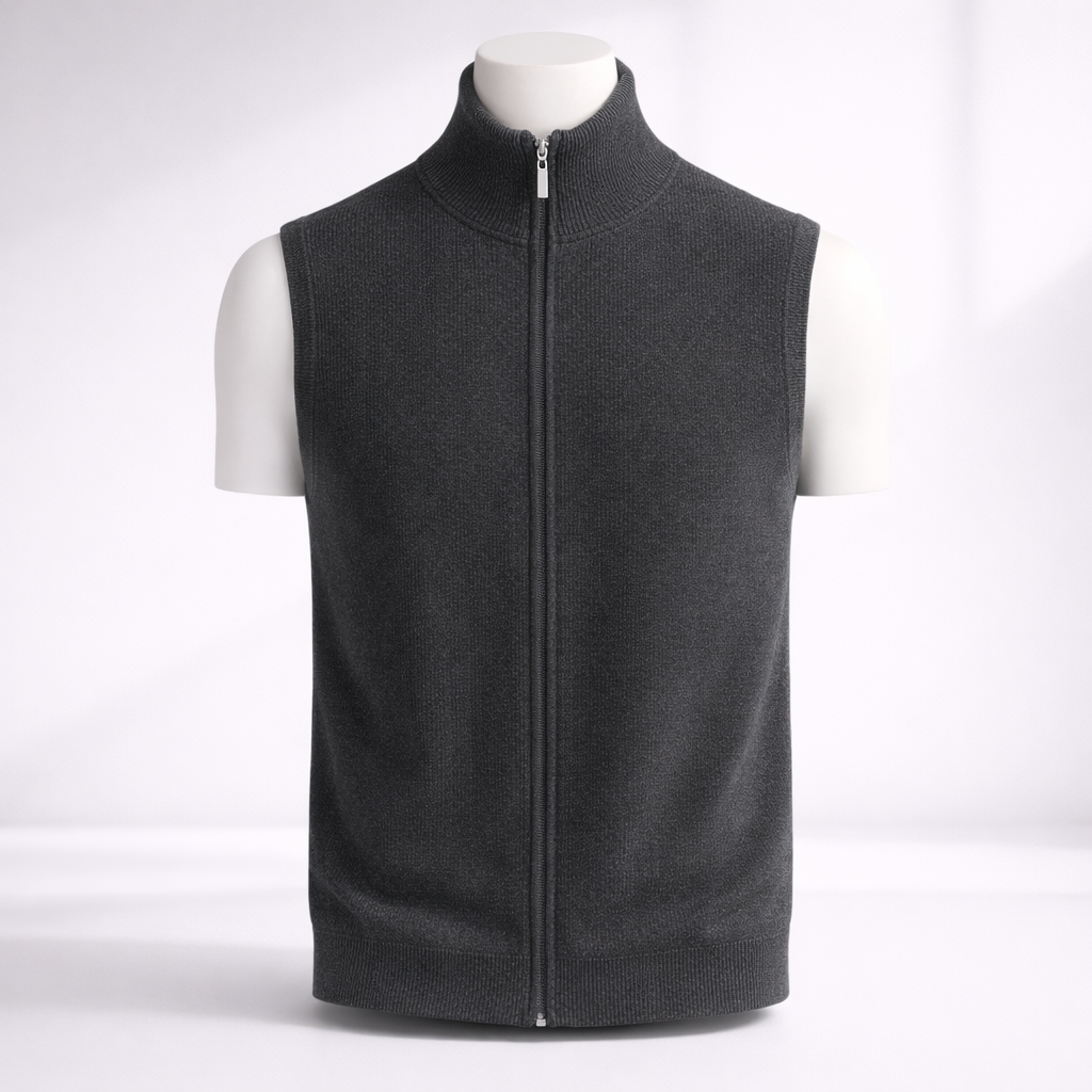 Dark charcoal merino wool men's zip-up vest with mock neck collar and ribbed trim, displayed on white mannequin