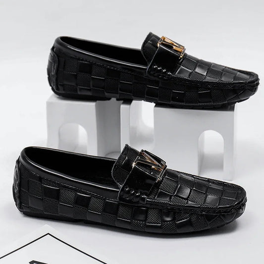 Black checkered slip-on loafers for men with gold metal buckle detail and textured pattern driving moccasins