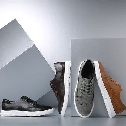 Four men's Brogan leather lace-up sneakers in black, dark brown, gray suede, and tan with white rubber soles