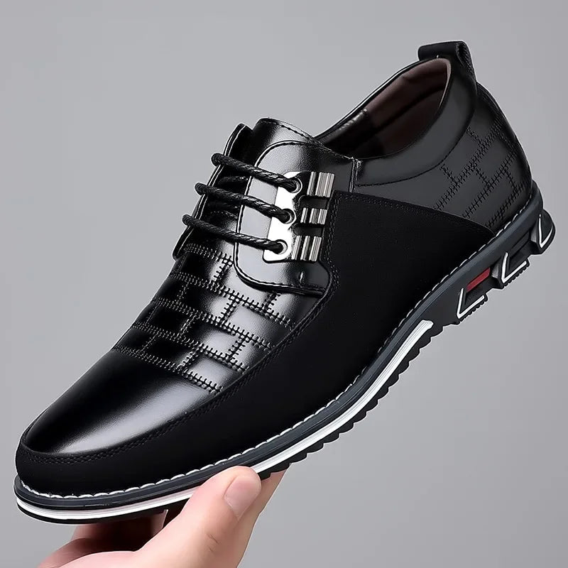 Black men's leather lace-up derby dress shoes with quilted texture, metal lace hardware, and sporty white sole.