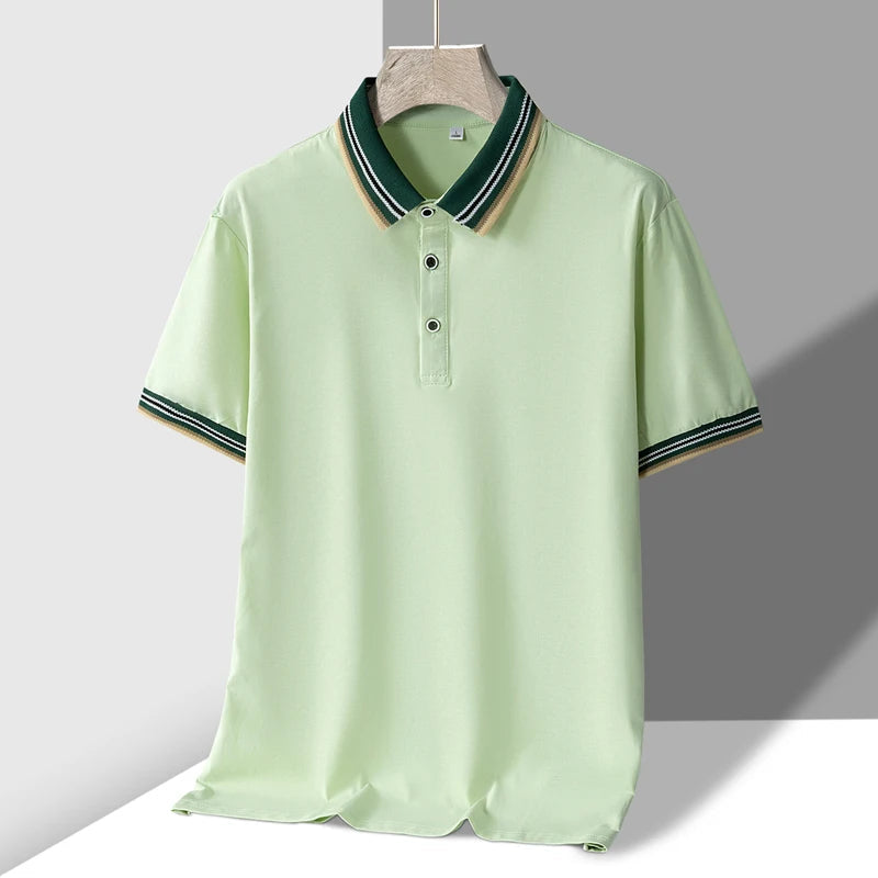 Light green men's polo shirt with striped green, white, and tan tipped collar and matching sleeve cuffs, short sleeves
