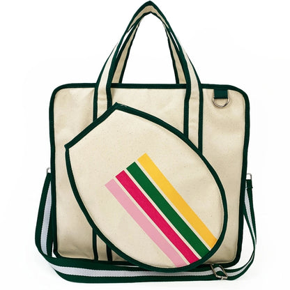 Cream canvas tote bag with dark green trim and handles, paired with a striped round pouch in pink, green, and yellow.