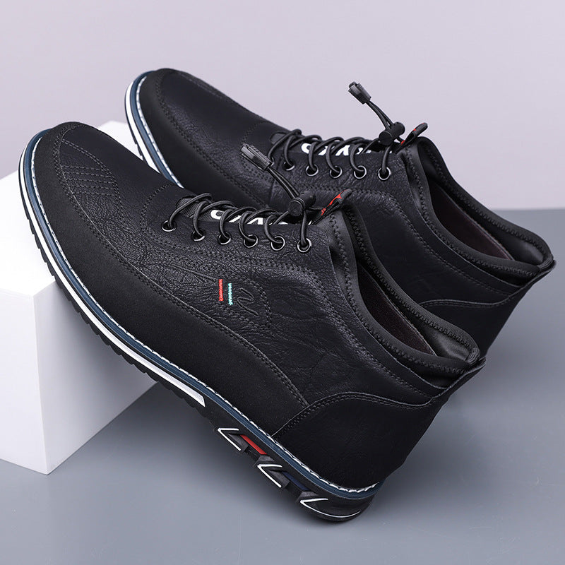 Black Torven leather mid-top men's sneakers with lace-up closure, colorful stripe detail, and blue-accented sole.