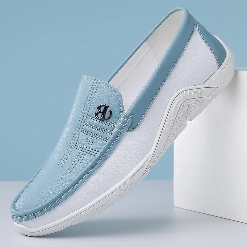 Light blue leather slip-on loafers for men with white sole and silver metal buckle detail