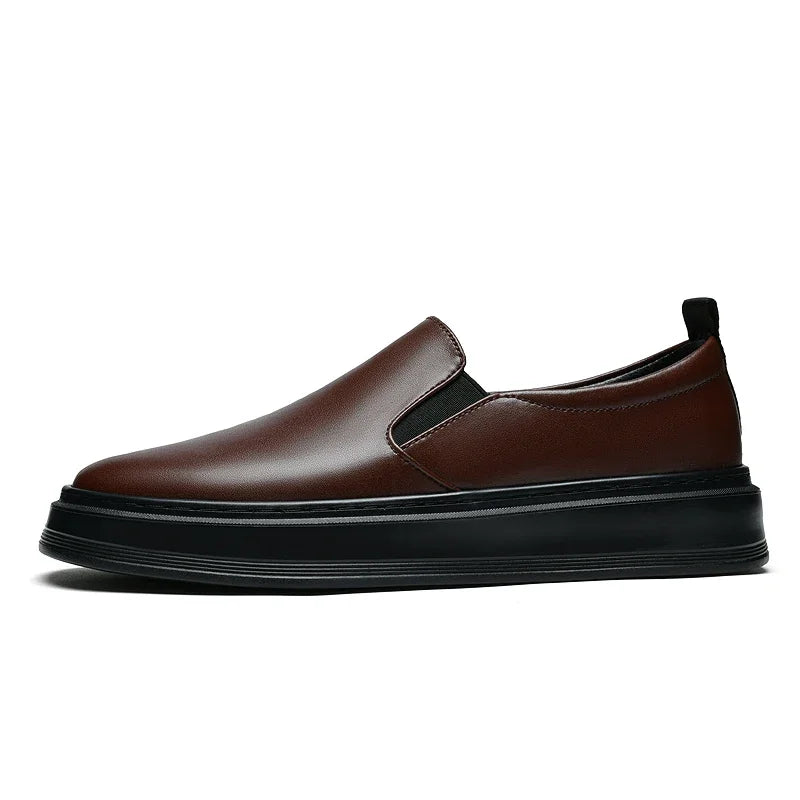 Brown leather slip-on loafers for men with elastic side panels and thick black rubber platform sole
