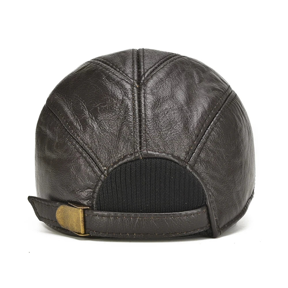 Back view of dark brown leather baseball cap showing panel stitching, mesh opening, and brass adjustable buckle strap.