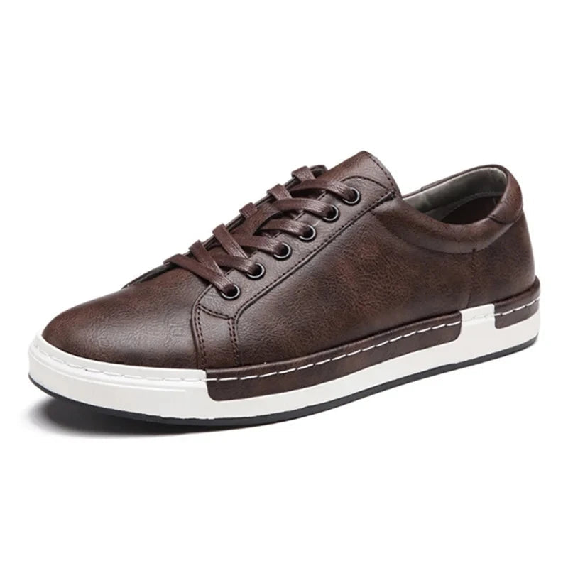 Brown men's lace-up low-top leather sneakers with white rubber sole and casual style on white background