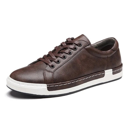Brown men's lace-up low-top leather sneakers with white rubber sole and casual style on white background