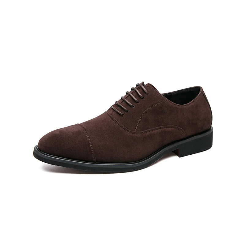 Dark brown suede men's cap-toe Oxford dress shoes with lace-up closure and black rubber sole on white background