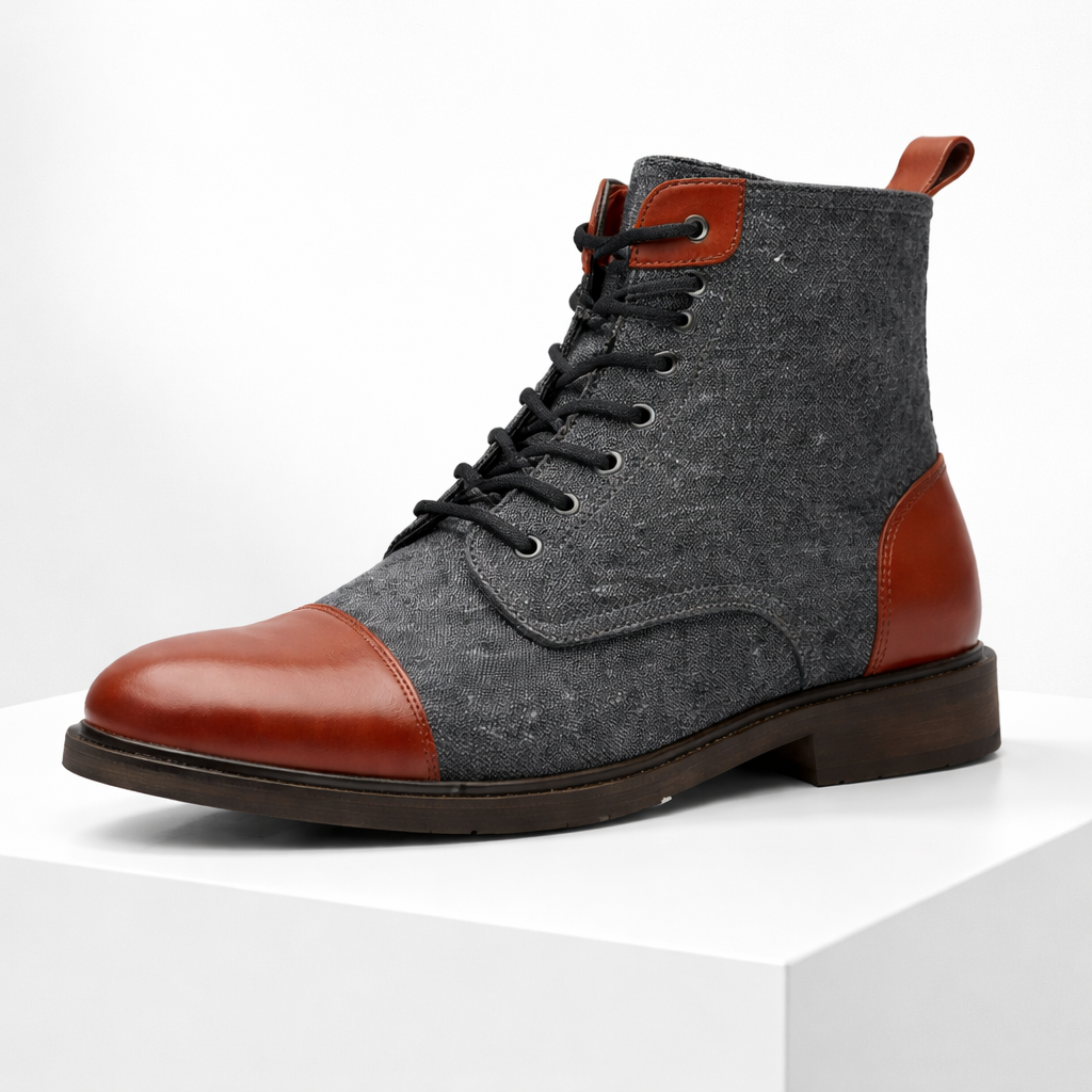 Men's lace-up ankle boots with gray textile upper, brown leather cap toe, heel counter, and dark rubber sole.
