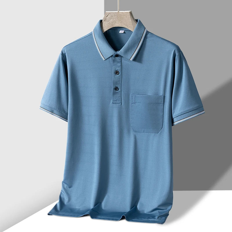 Men's blue short sleeve knit polo shirt with chest pocket and white tipped collar on hanger