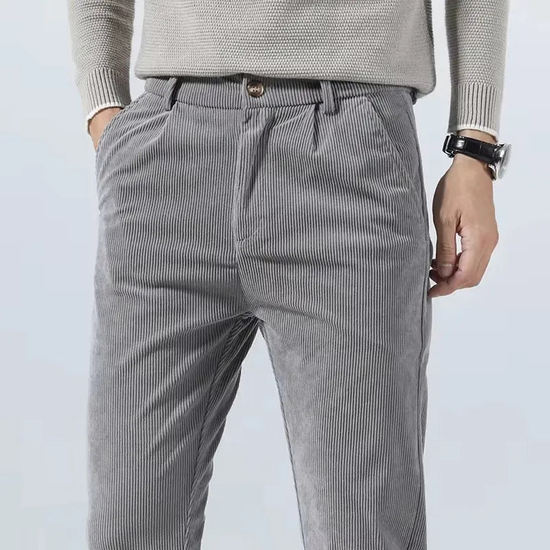 Men's gray corduroy slim fit chino pants with elastic waistband and front pockets