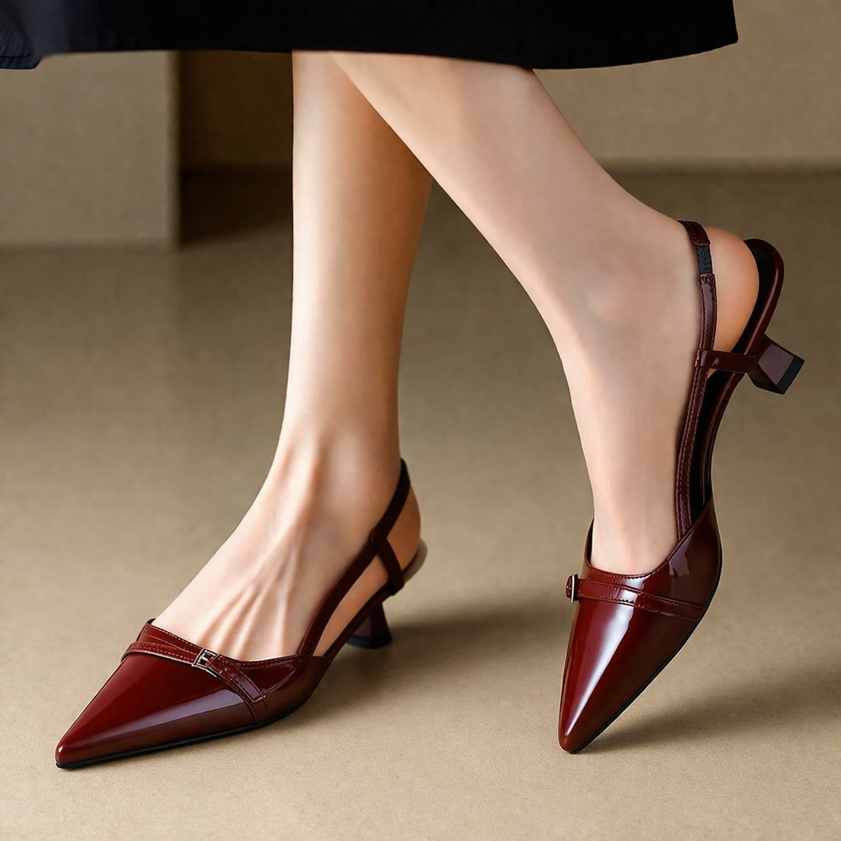 Burgundy patent pointed-toe slingback heels with low block heel and buckle strap for women
