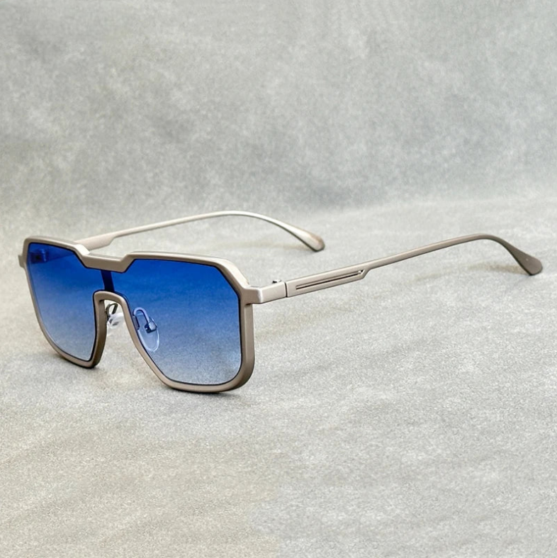 Silver frame square aviator sunglasses with blue gradient lenses for men on gray background