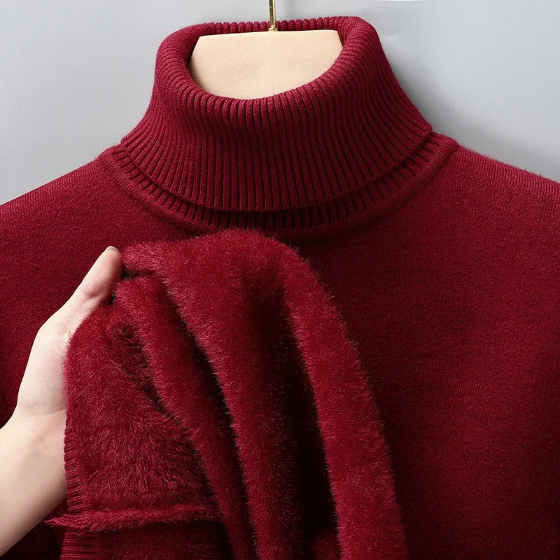 Burgundy men's merino wool turtleneck sweater with fleece lining shown inside out on mannequin hanger