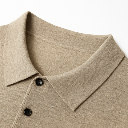 Men's beige merino wool long sleeve polo sweater with collar and black buttons detail