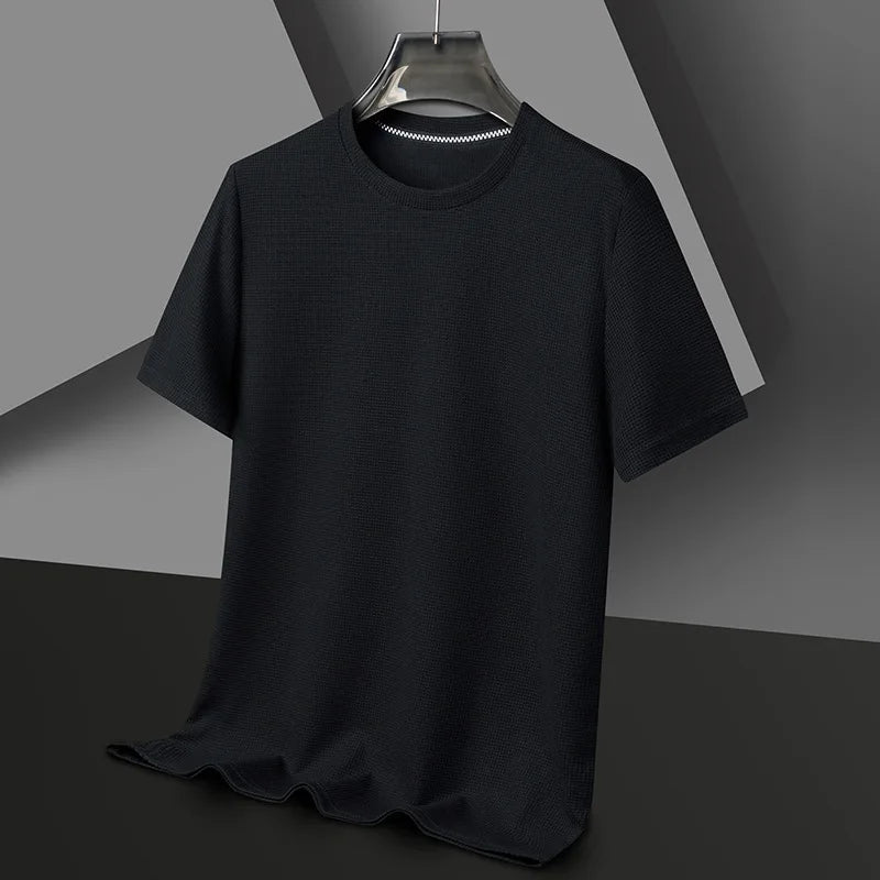 Black men's waffle knit crewneck t-shirt with short sleeves, displayed on hanger against gray background.