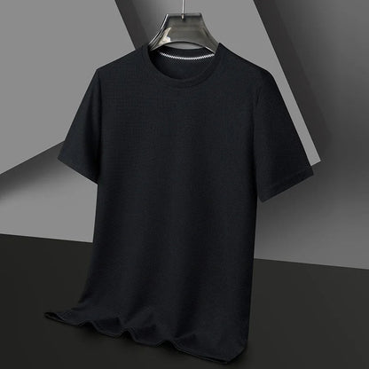 Black men's waffle knit crewneck t-shirt with short sleeves, displayed on hanger against gray background.