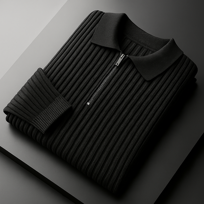 Black ribbed cotton men's quarter-zip sweater with polo collar, neatly folded, showing silver zipper detail.