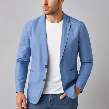 Men's light blue nylon two-button blazer jacket with notch lapels worn over white tee and jeans